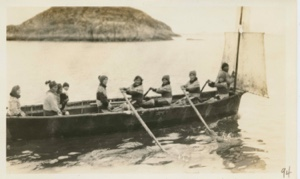 Image of Oomiak [umiak] made of seal skins, rowed by girls